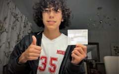 Andrew Salguero shows his COVID vaccination card, indicating he is fully vaccinated. Andrew attends Jame Monroe HIgh School in North Hills, California