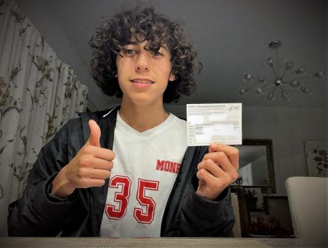 Andrew Salguero shows his COVID vaccination card, indicating he is fully vaccinated. Andrew attends Jame Monroe HIgh School in North Hills, California